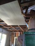 Helping to repair an upstairs room